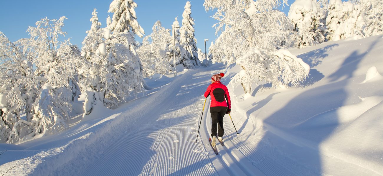 Woman cross country skiing in Finland