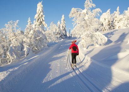 Woman cross country skiing in Finland