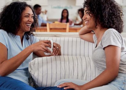 A mother and daughter chatting