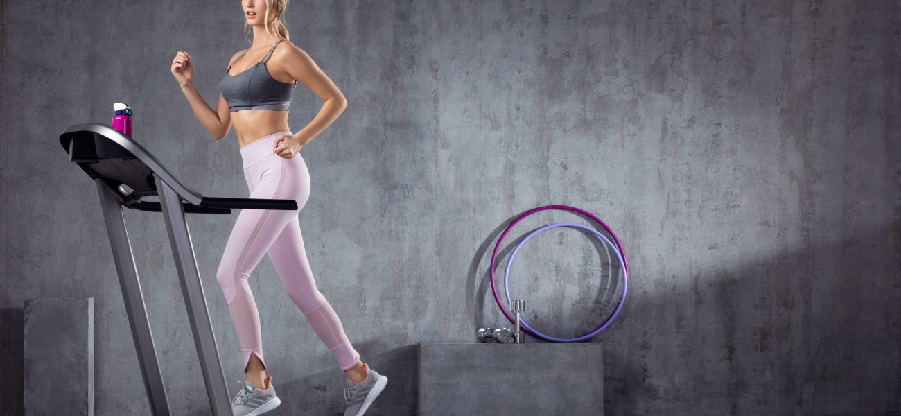 A woman working-out on treadmill