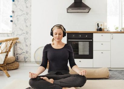 woman meditating at home stress relief