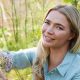 Jodie Kidd picking wild flowers