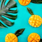 Prepared mango on a bright blue background