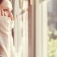 Woman looking out of the lonely wishing for a friend