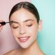 Woman-applying-eyebrow-gel