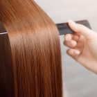 Shiny hair being brushed