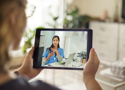 woman having virtual doctors appointment