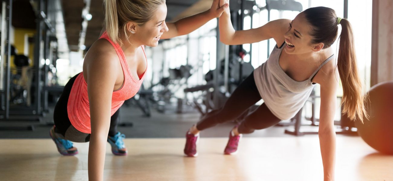 Gym buddies working out