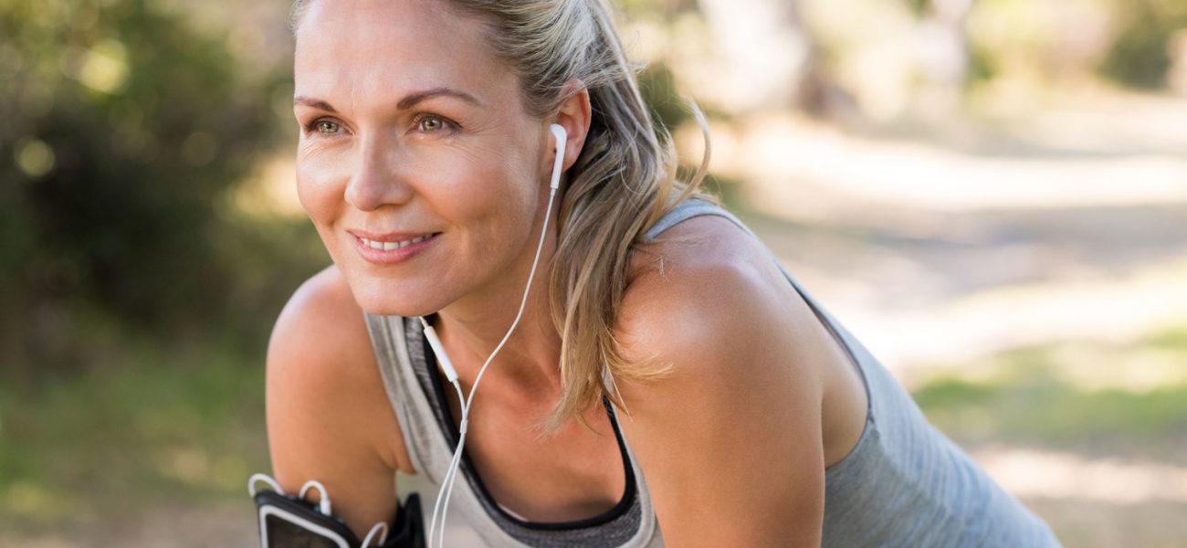 Woman jogging to improve her heart health