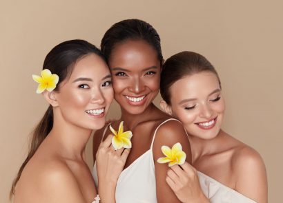 Smiling diverse women with healthy glowing skin