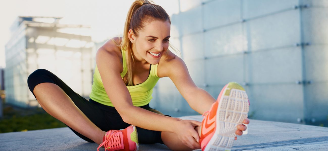 motivated woman stretching