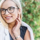 blonde woman wearing glasses