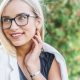 blonde woman wearing glasses
