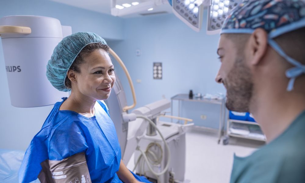 woman receiving medical consultation in a hospital