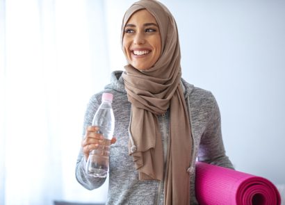 Muslim woman exercising during Ramadan