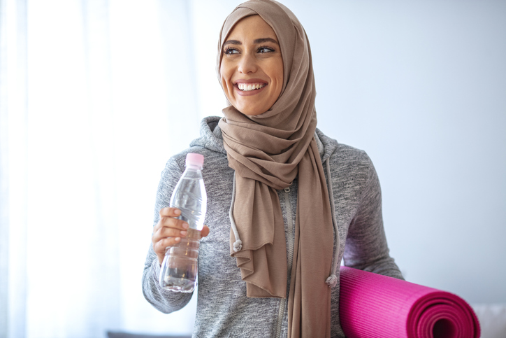 Muslim woman exercising during Ramadan