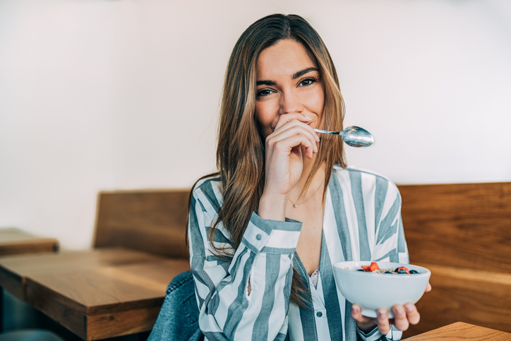 Woman enjoying sweet recipe