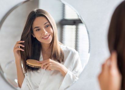 Woman with dry hair after using a quick dry hairdryer