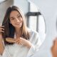 Woman with dry hair after using a quick dry hairdryer