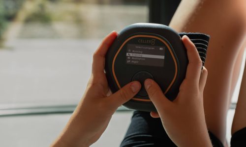 A CELLER8 PEMF device held in two hands