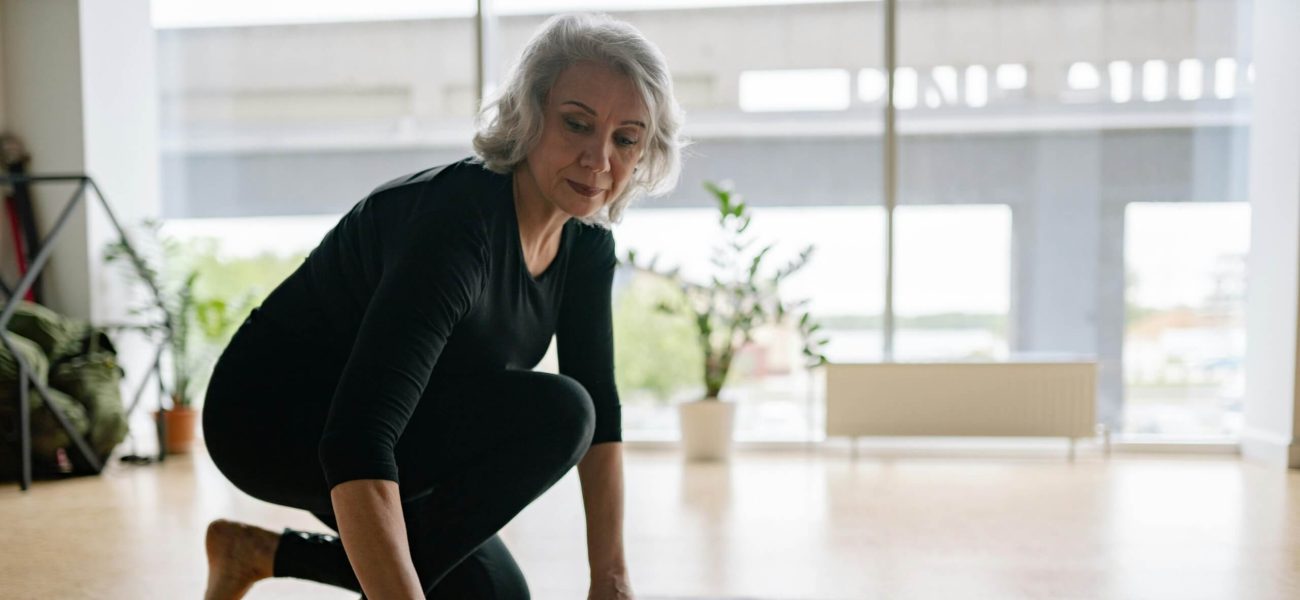 A woman exercising at home