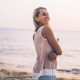 A woman smiling on the beach