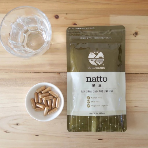 A packet of Sonomono Natto Capsules on a table, with a dish of capsules beside it