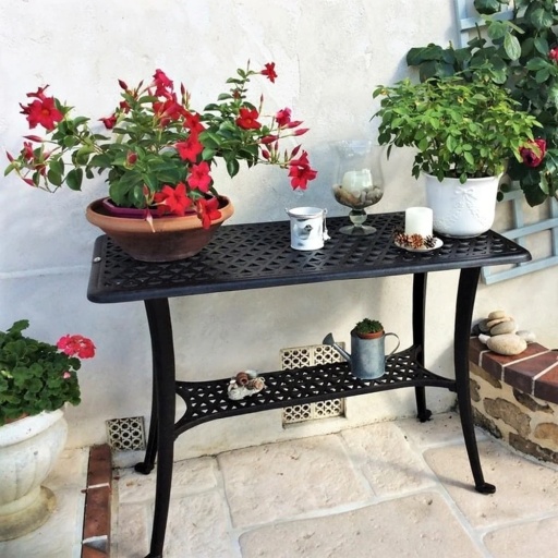 The Lazy Susan BBQ Table standing outside on a patio