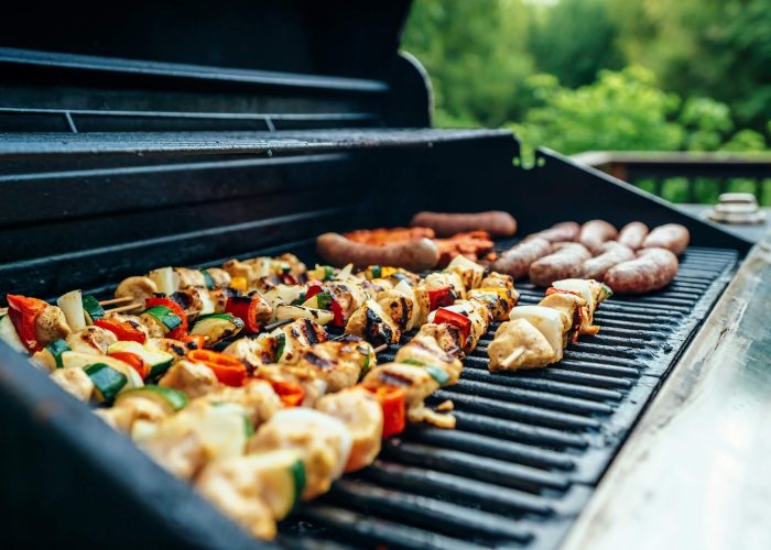 A selection of food on a BBQ