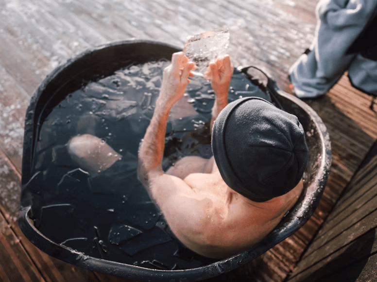 A male athlete in an ice bath