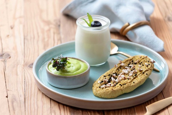 A selection of healthy foods on a plate on a wooden table