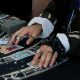 A man laying out tarot cards on a table
