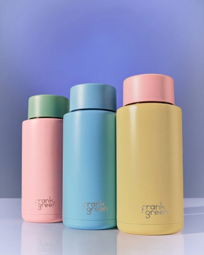 Three Frank Green Customisable Ceramic Bottles in pink, blue and yellow