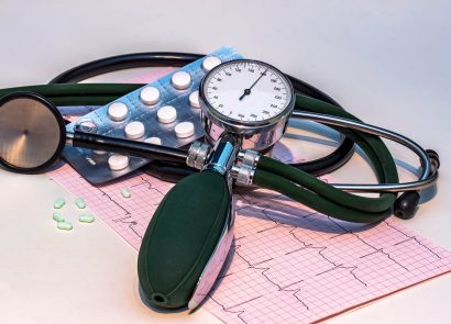 An electrocardiogram, stethoscope and medication associated with high blood pressure