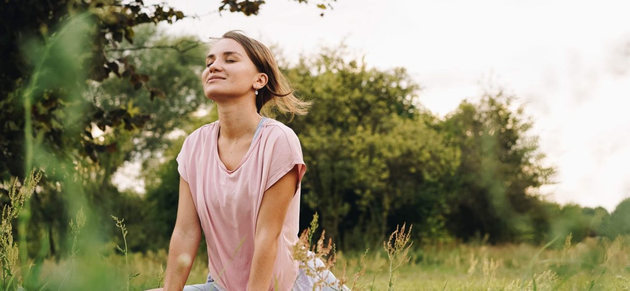A young woman relaxing in a park