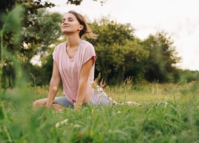A young woman relaxing in a park